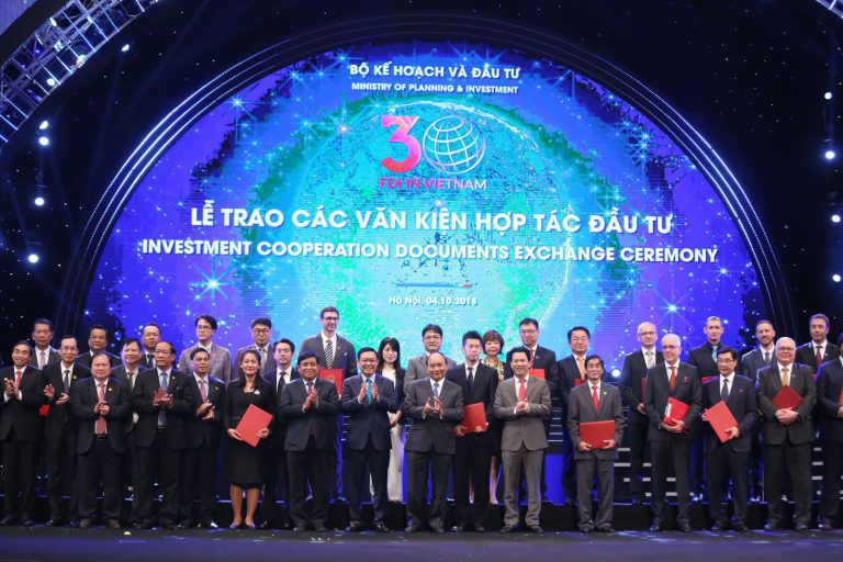 Investment Corporation Documents Exchange Ceremony in Hanoi